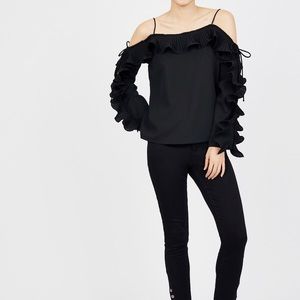 Ruffled black blouse, NWOT sexy